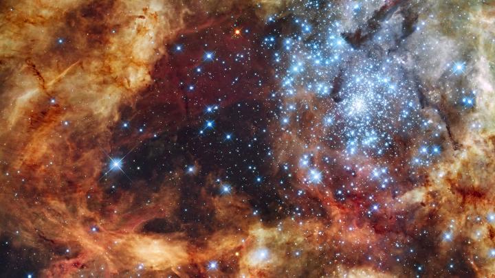 Star Cluster R136 Bursts Out. Image Credit: NASA, ESA, & F. Paresce (INAF-IASF), R. O'Connell (U. Virginia), & the HST WFC3 Science Oversight Committee 