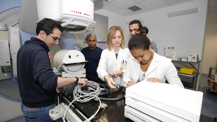 Medical physicists working in a hospital