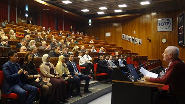 ICTP scientist Luciano Bertocchi addresses MMP graduates and audience at the first MMP graduation ceremony ICTP scientist Luciano Bertocchi addresses MMP graduates and audience at the first MMP graduation ceremony