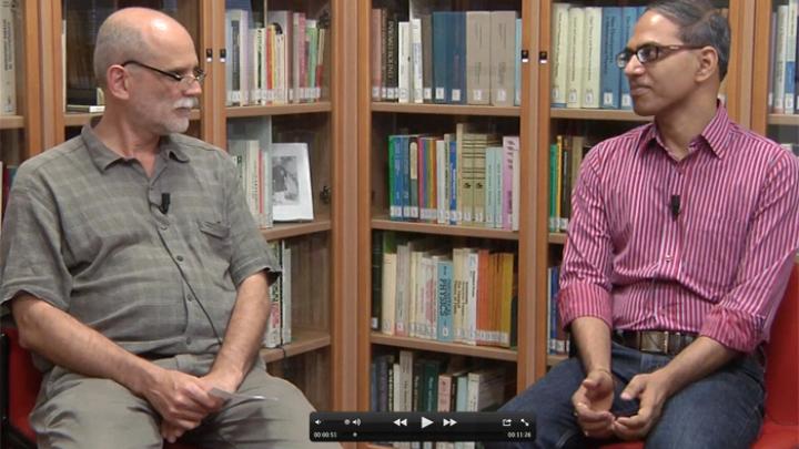 ICTP Mathematics Section Head Fernando Villegas (left) interviews Ramanujan Prize recipient Amalendu Krishna