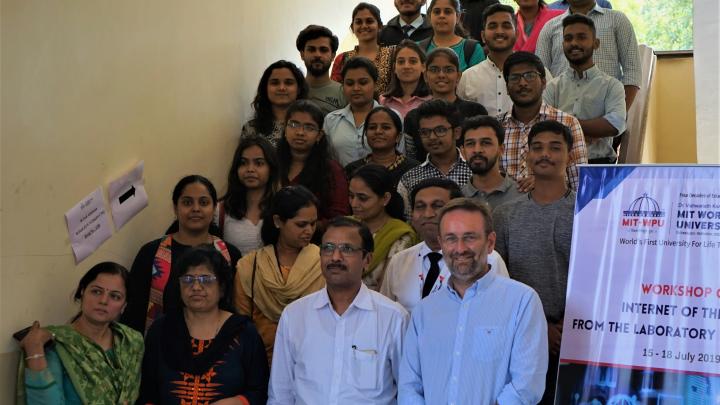 Marco Zennaro and Bharat Chaudhari (first and second from right) during a workshop at MIT World Peace University, Pune, India in 2019